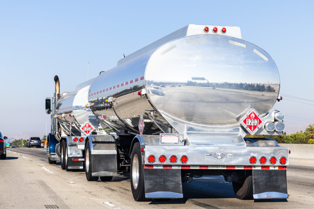 tanker truck driving on the freeway